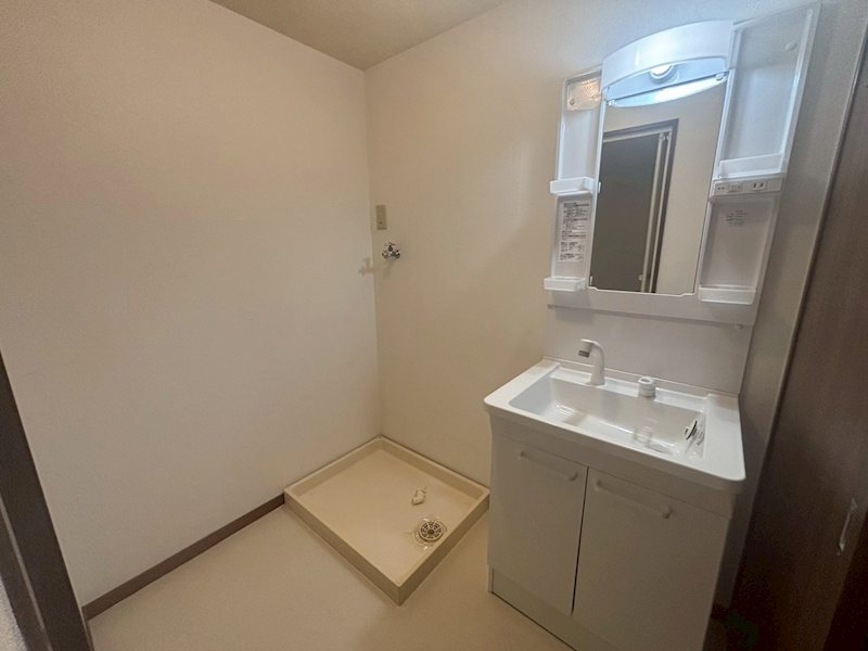 洗面設備　※写真は110号室です。