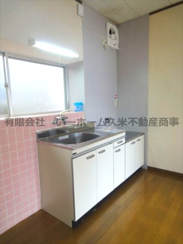 山下宅二戸一建のキッチン写真