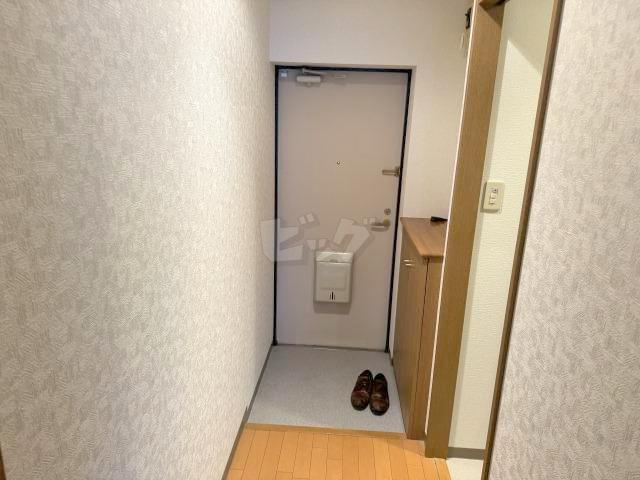 地下鉄東豊線 元町駅 徒歩14分 3階建 築24年の玄関写真