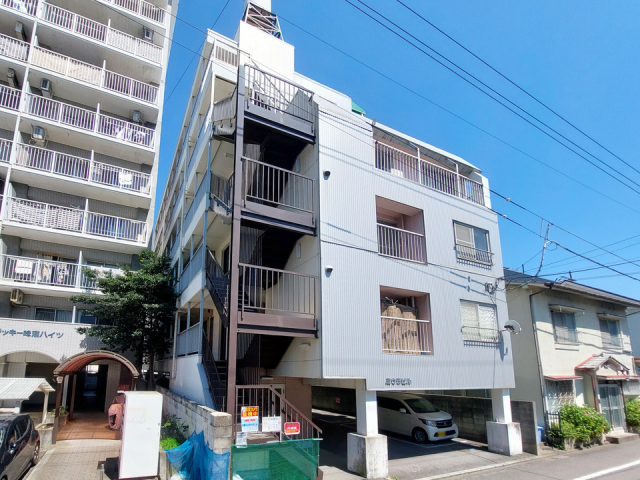 松山市味酒町のマンションの建物外観