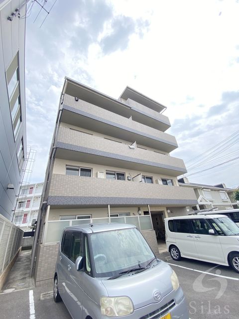 堺市西区浜寺船尾町西のマンションの建物外観