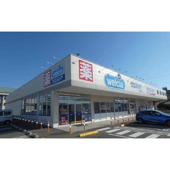 ドラックストア　ウエルシア内灘店（ドラッグストア）まで587m