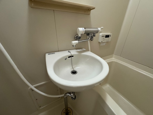 洗面設備　※写真は別部屋です。現況優先