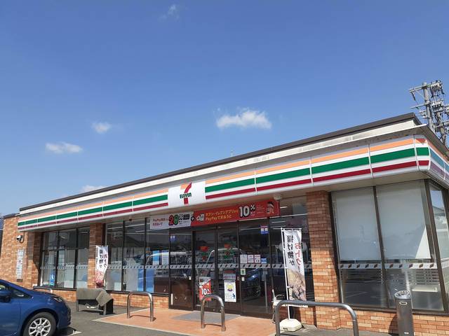 コンビニ　セブンイレブン亀山川崎店（コンビニ）まで450m