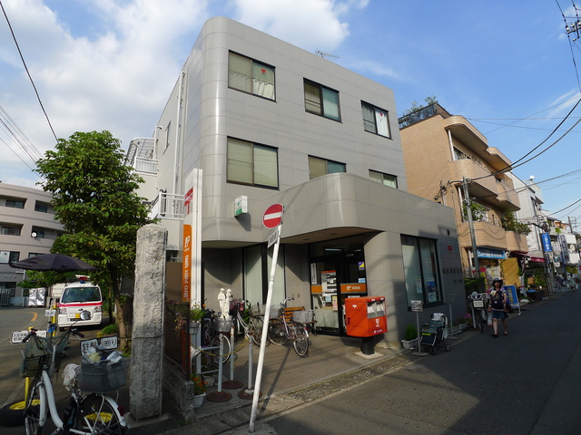 郵便局　稲田堤郵便局（郵便局）まで859m