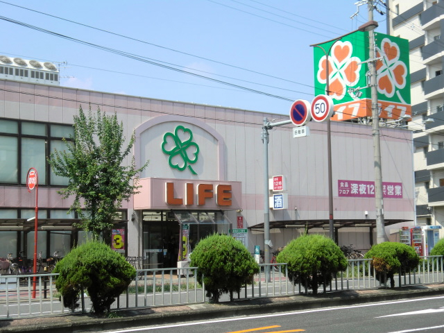スーパー　ライフ 十三東店（スーパー）まで612m