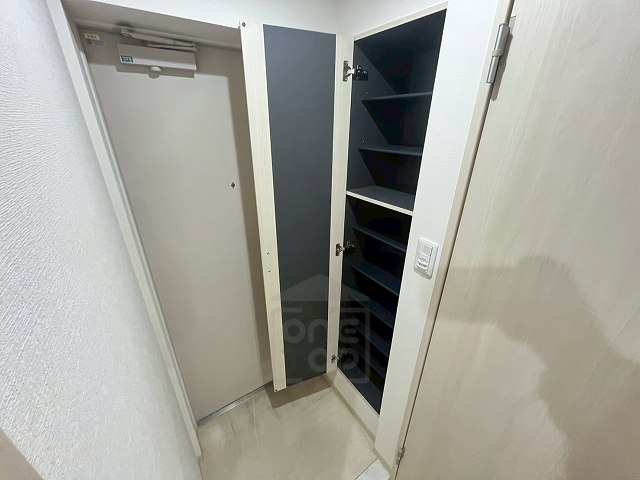 阪急宝塚線 服部天神駅 徒歩5分 4階建 築12年の玄関写真