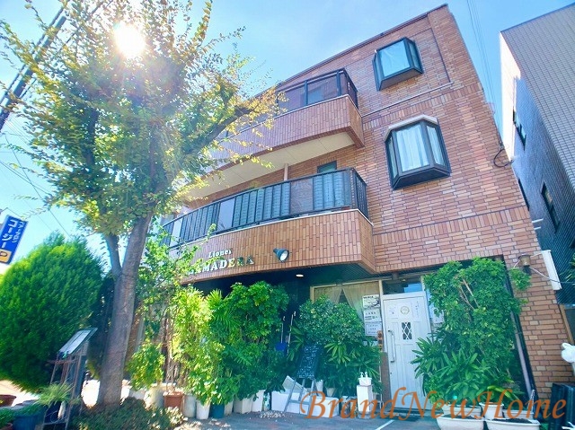 堺市西区浜寺昭和町のマンションの建物外観