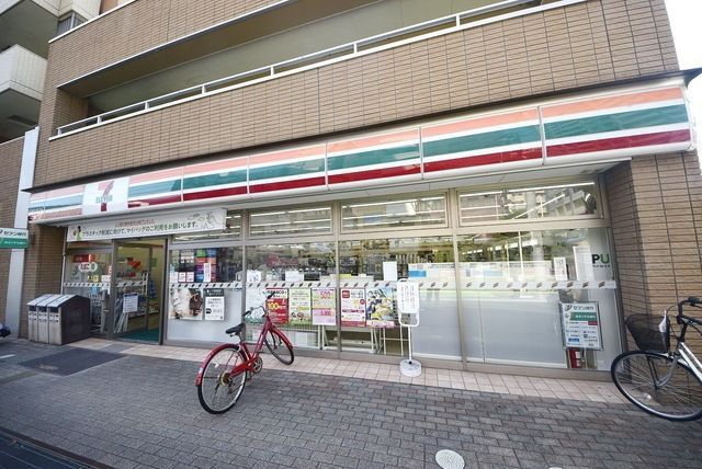 コンビニ　セブンイレブン草加住吉店（コンビニ）まで916m