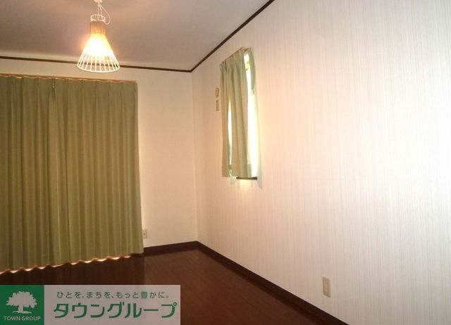 オークフォレスト油屋町C棟の居間写真