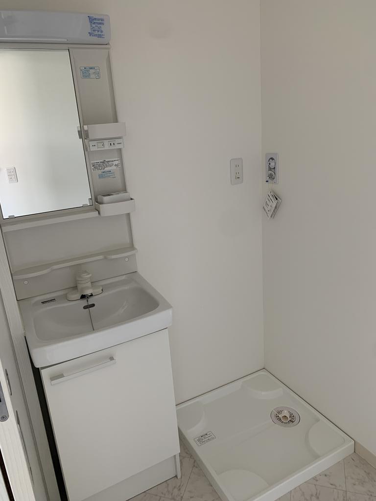 洗面設備　※他の号室の写真です