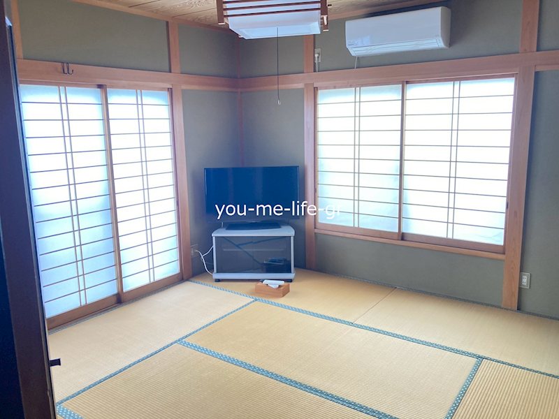 南豊田一戸建の居間写真