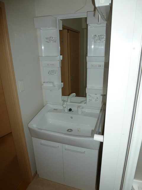 洗面設備　写真は201号室です