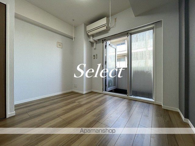 プレセダンヒルズ阪東橋の居間写真