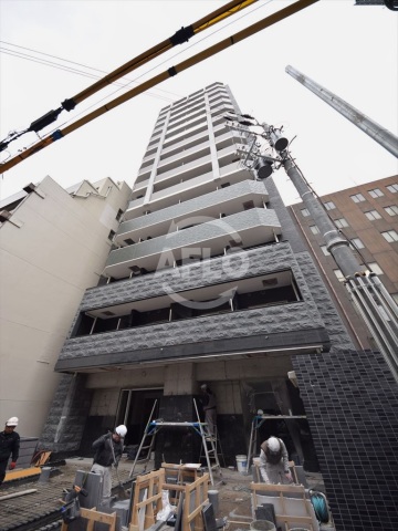 ロビー　プレサンス本町エクセトラ　分譲らしい重厚感のある外観