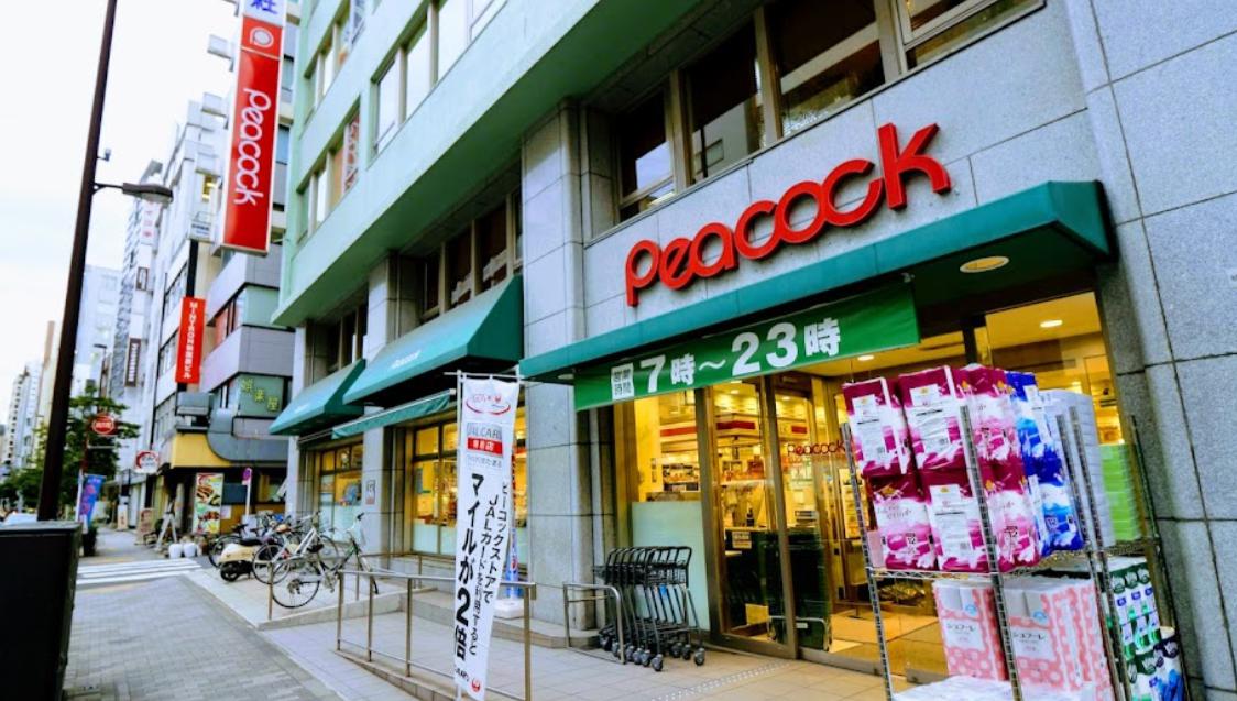 スーパー　ピーコックストア 神田妻恋坂店（スーパー）まで1077m