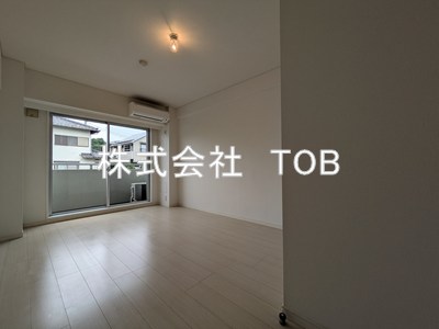 アンビックスつつじヶ丘 A棟の居間写真