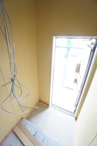 玄関　※建設中の写真です。