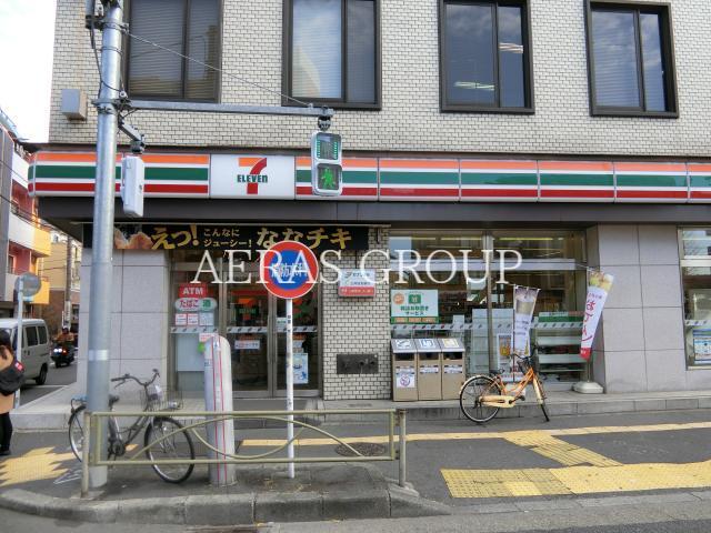 コンビニ　セブンイレブン足立中居郵便局前店（コンビニ）まで84m