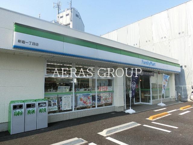 コンビニ　ファミリーマート 新堀一丁目店（コンビニ）まで449m