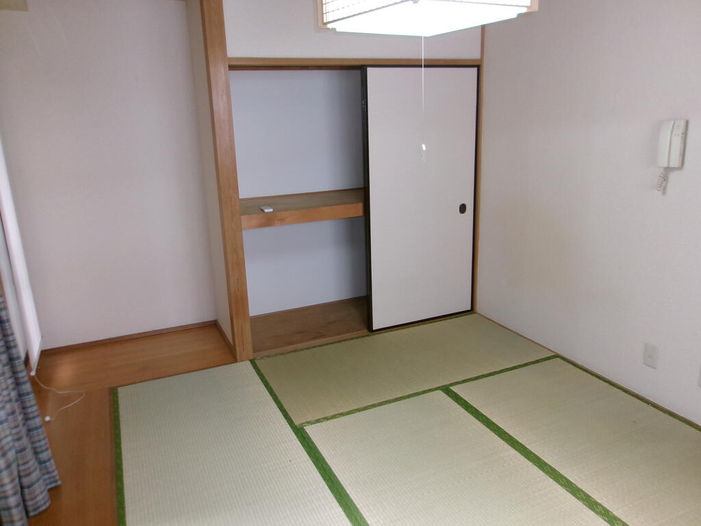 つるがねビルの居間写真