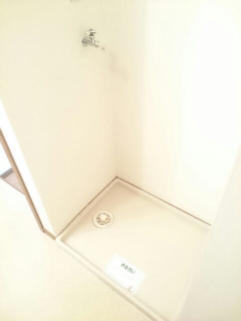 バルコニー　室内洗濯機置場