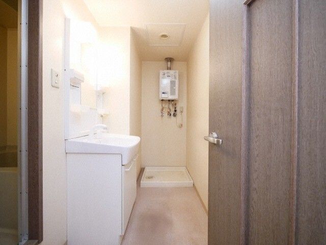 洗面設備　※写真は別号室です。