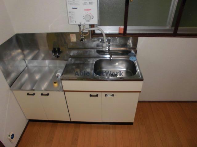 メゾンドミラージュのキッチン写真