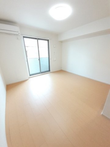 グランツ光 1Kの居間写真