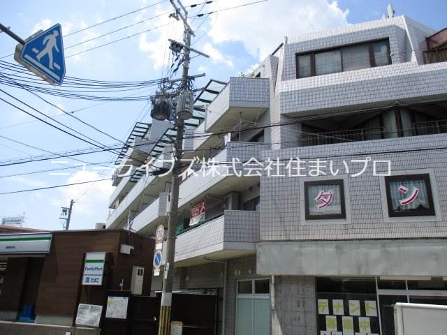 寝屋川市萱島信和町のマンションの建物外観