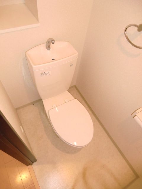 トイレ　※同タイプ住戸参考写真　現況優先