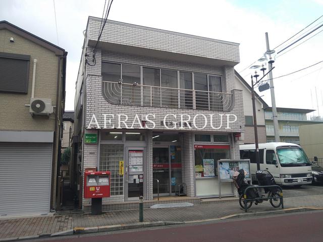 郵便局　足立本木郵便局（郵便局）まで497m