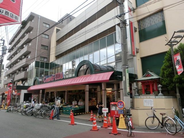 スーパー　コモディイイダ食彩館桜川店（スーパー）まで989m