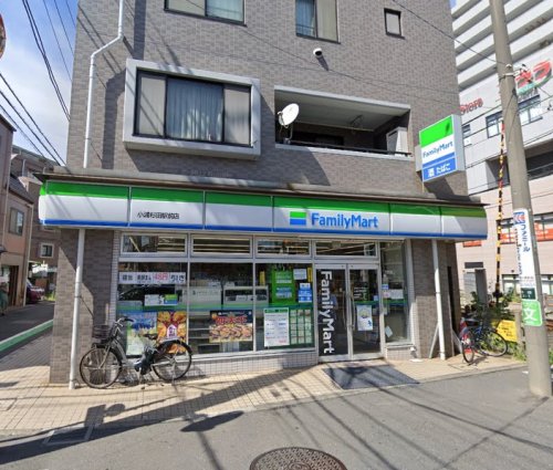 コンビニ　ファミリーマート（コンビニ）まで779m