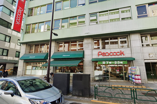 スーパー　ピーコックストア神田妻恋坂店（スーパー）まで875m