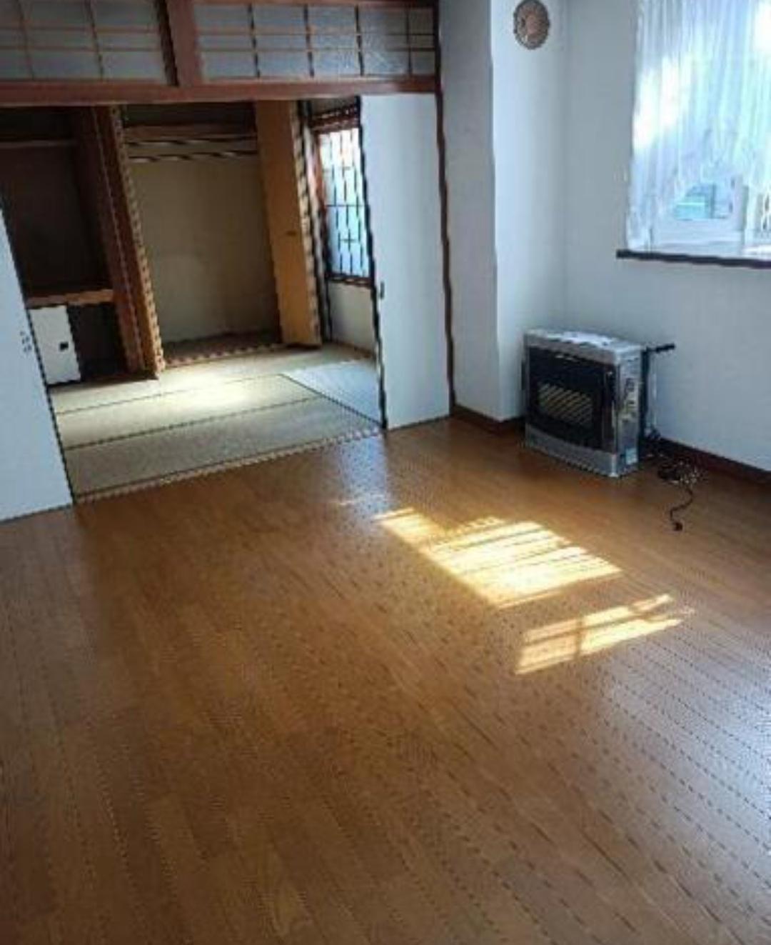 手稲稲穂4-6戸建ての居間写真
