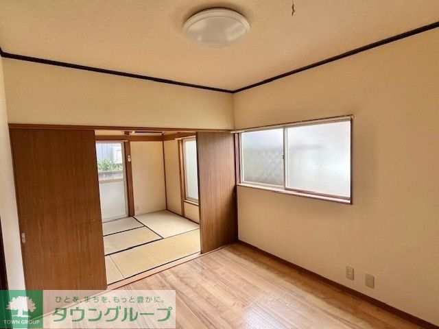 コーポレーション氷川の居間写真
