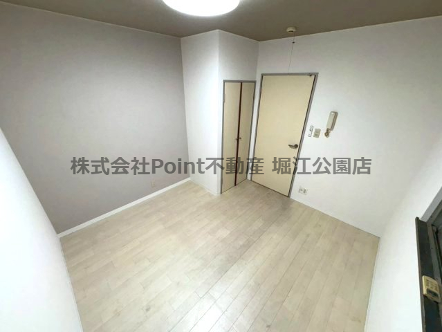 地下鉄御堂筋線 大国町駅 徒歩7分 5階建 築41年の居間写真