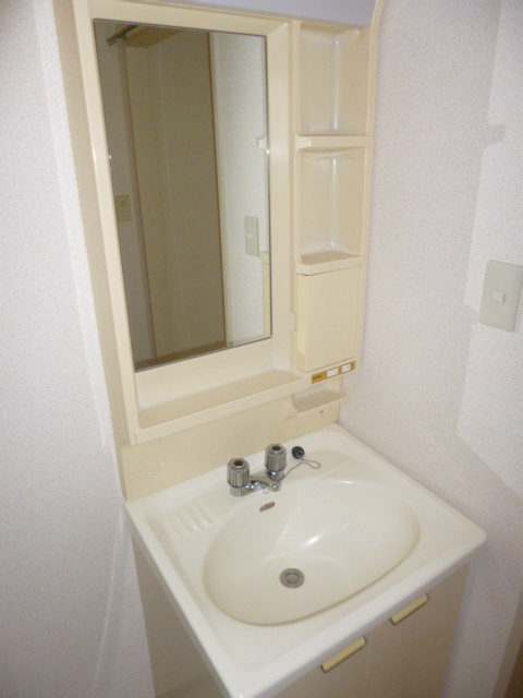 洗面設備　※写真は101号室のお部屋です。
