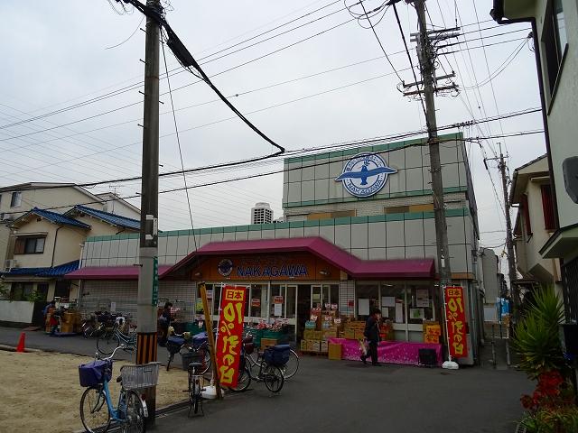 スーパー　スーパーストアナカガワ高槻店（スーパー）まで678m