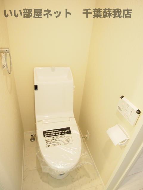 トイレ　落ち着いた色調のトイレです