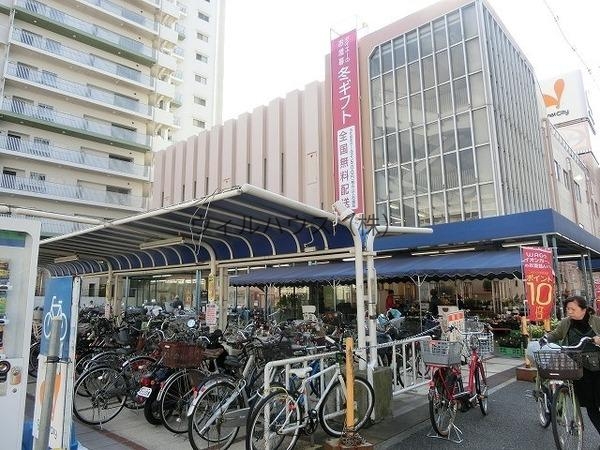 スーパー　ダイエーグルメシティ津久野店（スーパー）まで938m