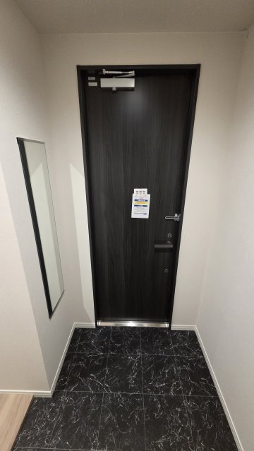 WING TOWA MAISONの玄関写真