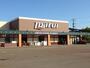 スーパー　スーパーマルイ塚野目店（スーパー）まで1209m