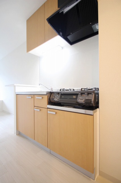 キッチン　写真は別号室のものです。