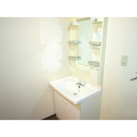 洗面設備　※写真は同じマンションの違う部屋のものになります。