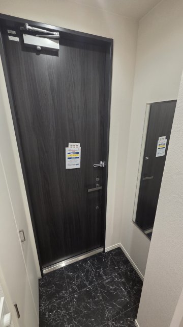 WING TOWA MAISONの玄関写真