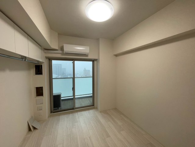 プレサンス ジェネ 四日市中央通りの居間写真