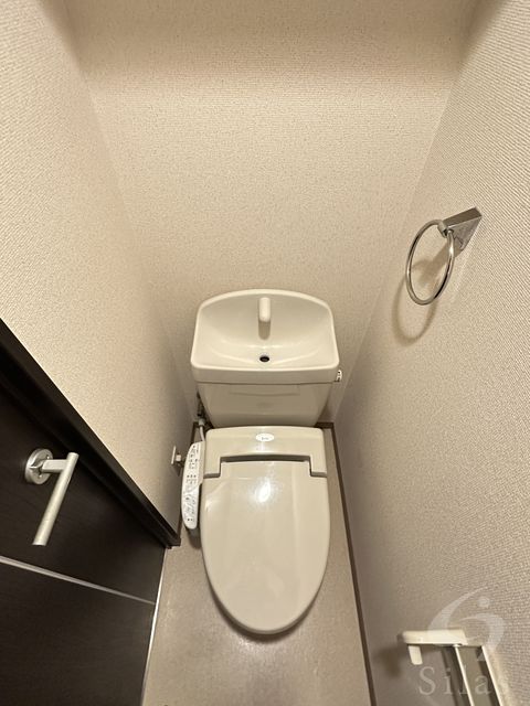 ＪＲ東海道本線 千里丘駅 徒歩10分 3階建 築15年のトイレ写真