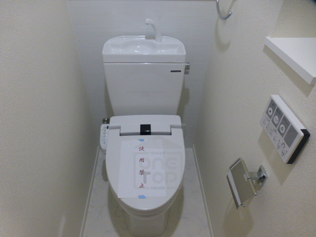 地下鉄御堂筋線 江坂駅 徒歩5分 15階建 築12年のトイレ写真